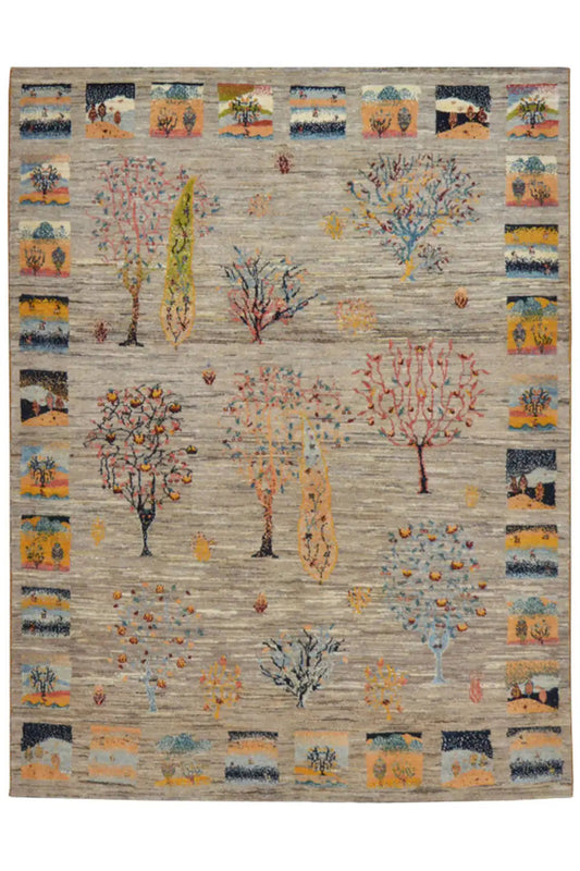 Gabbeh rug with tree and patterned motifs, colorful on a light background
