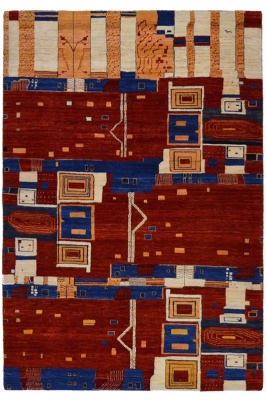 Gabbeh rug with a geometric pattern in red, blue, beige, and white