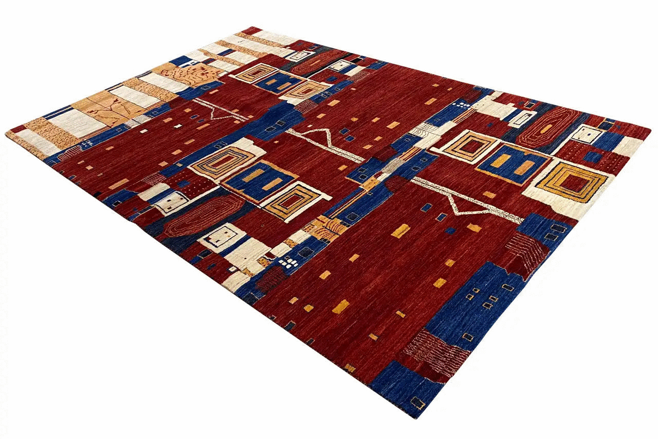 Gabbeh rug: red pattern with blue and cream-colored squares and decorative lines