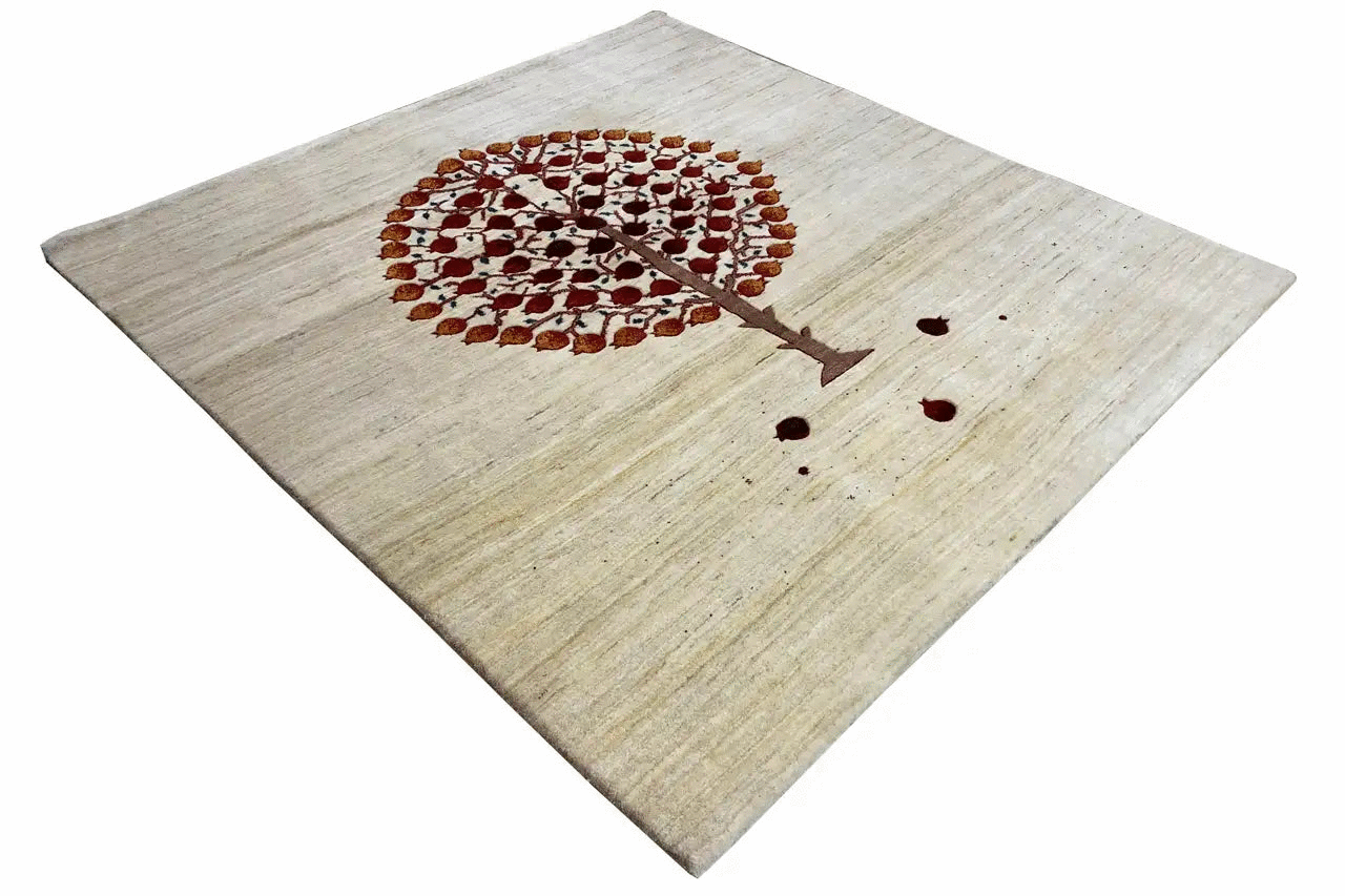 Gabbeh rug, light beige with a tree motif in brown/burgundy, viewed diagonally
