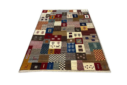 Gabbeh rug with geometric tile patchwork in brown, blue, red and beige