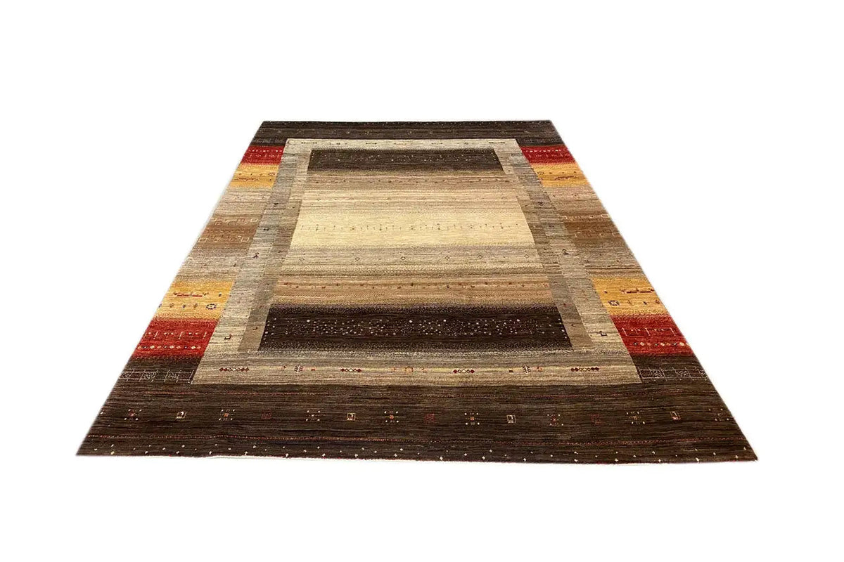 Gabbeh rug viewed from above: central stripe in beige with darker brown areas