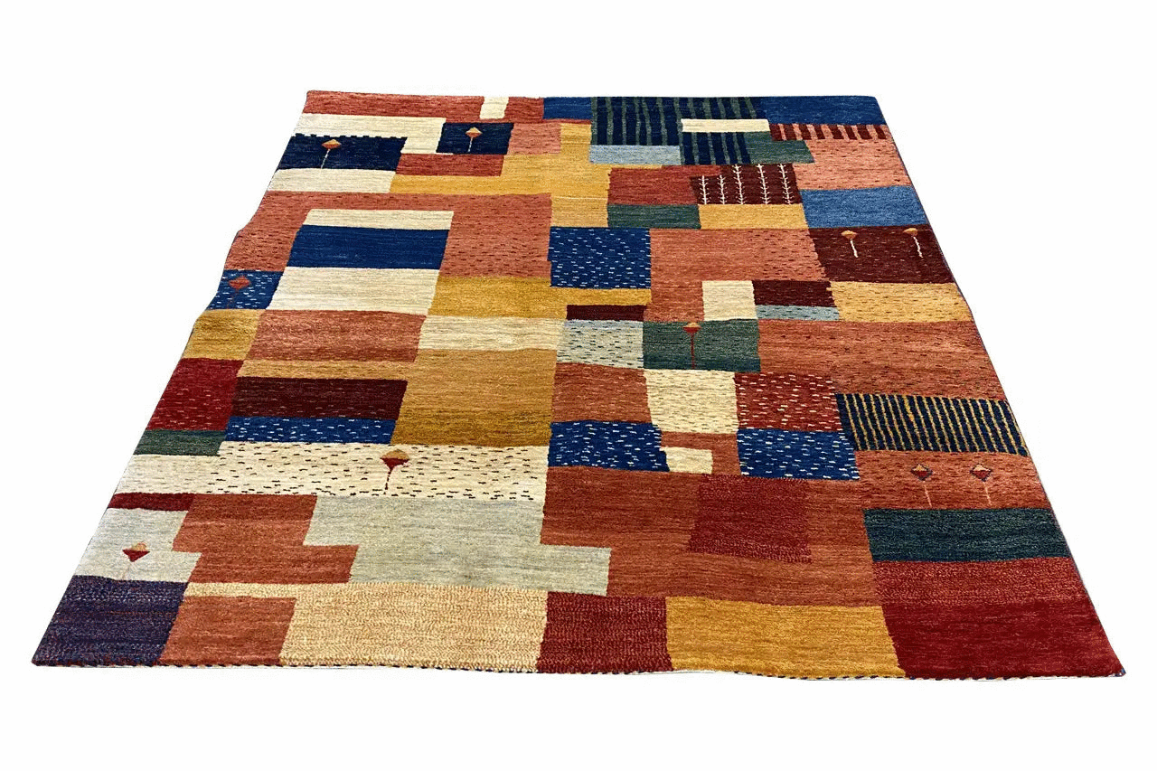 Rug with an abstract patchwork of rectangles and squares in blue, red, and yellow
