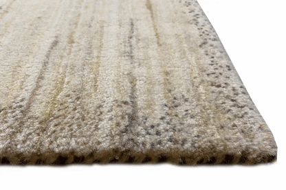 Gabbeh rug close-up: pile surface with a beige textured edge