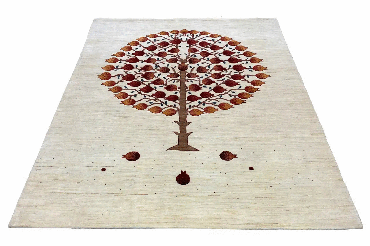 Gabbeh rug with a centered tree motif, light-colored field with brownish-red dots and fine speckles