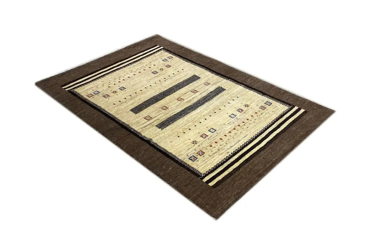 Gabbeh rug, edged in brown, beige field with stripes and small ornaments