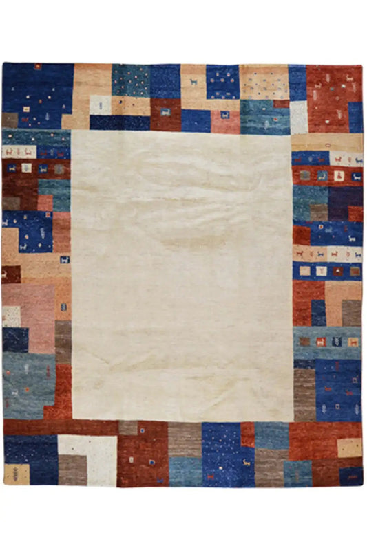 Rectangular rug with a cream-colored center and a blue and red patchwork border