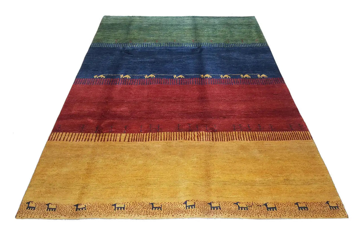 Gabbeh rug in a three-stripe design: green, blue and red on yellow with animal motifs