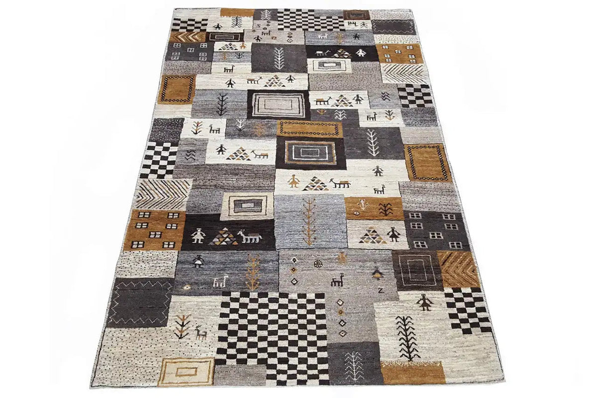 Gabbeh rug, rectangular, with geometric shapes and a border in gray/beige/brown.