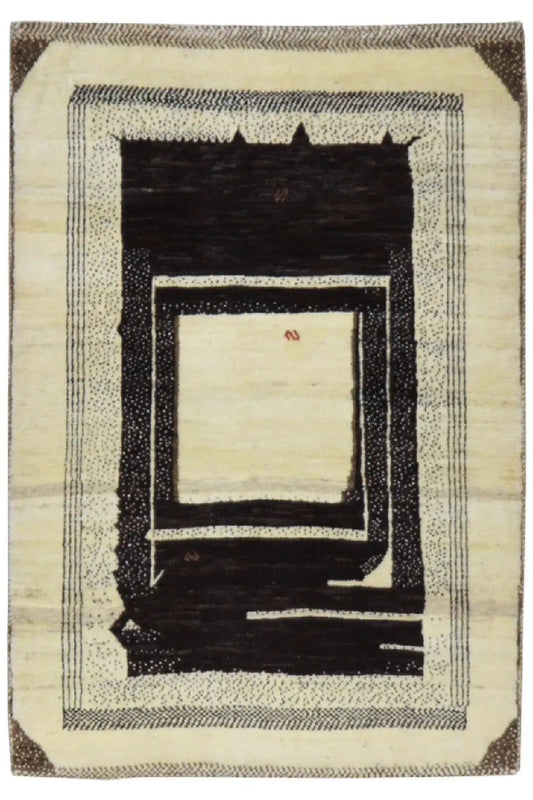 Gabbeh rug 123x83 cm with a geometric square pattern in cream and dark brown.