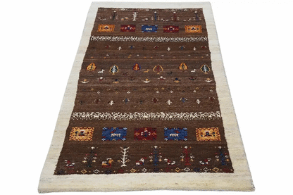 Gabbeh rug 139x67 cm, brown field pattern with rows of symbols, cream-colored border