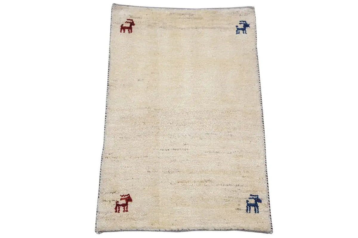 Gabbeh rug 86x56 cm, rectangular, beige background with four animal motifs in red/blue