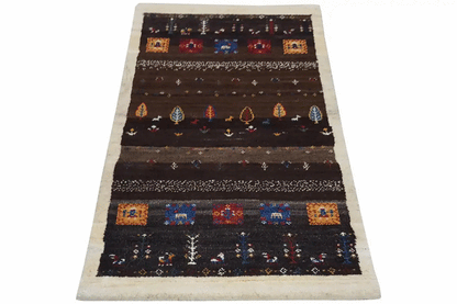 Gabbeh Lori rug, rectangular, in dark brown with colorful rows and a border