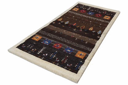 Gabbeh-Lori rug with colorful block motifs and geometric lines in dark brown