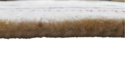 Gabbeh rug detail: dense, deep pile with a fine texture and woven-edge finish