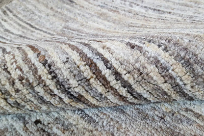 Gabbeh rug: Detail of the woven pattern with high-contrast lines and a mottled texture