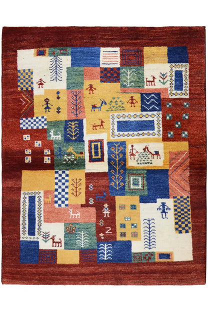 Gabbeh Luri rug with a patchwork pattern of colorful fields and a red border