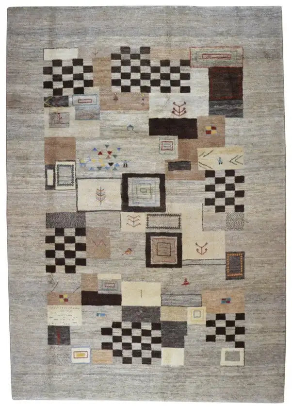 Gabbeh rug with an abstract patchwork design in beige, black, and brown