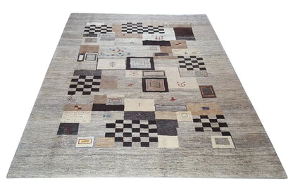 Gabbeh rug with a square patchwork pattern, beige with black-brown accents