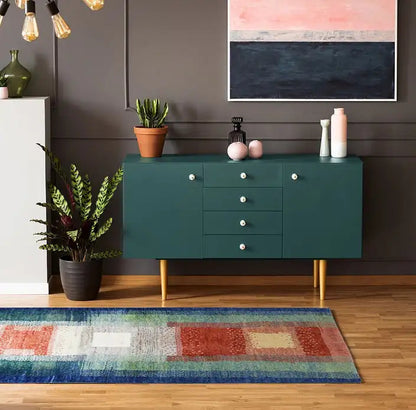Rectangular Gabbeh rug with a patchwork pattern in blue, green, red, and cream