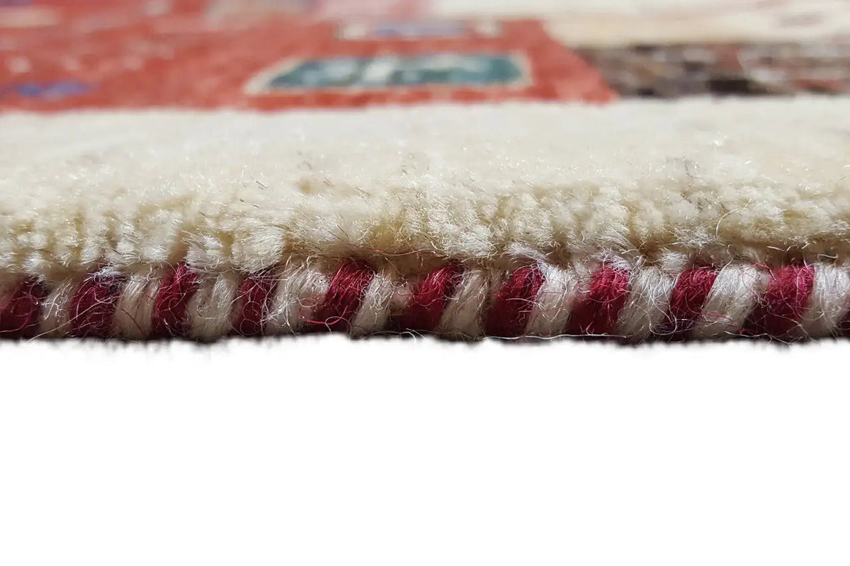 Gabbeh rug edge with short red-and-white fringes, detail of the edge