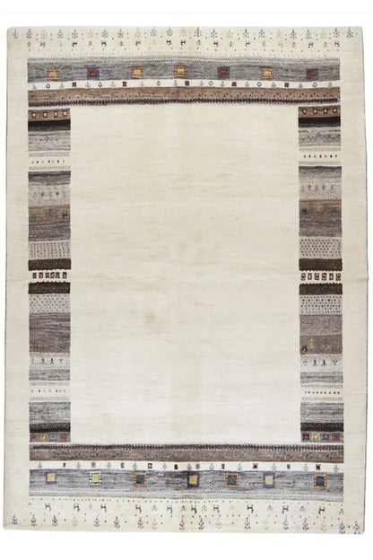 Gabbeh rug with white pile and a multicolored border pattern along the edges