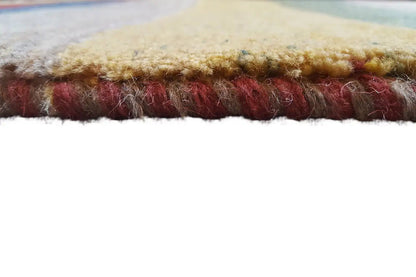 Close-up of the carpet edge: dense pile and colored binding
