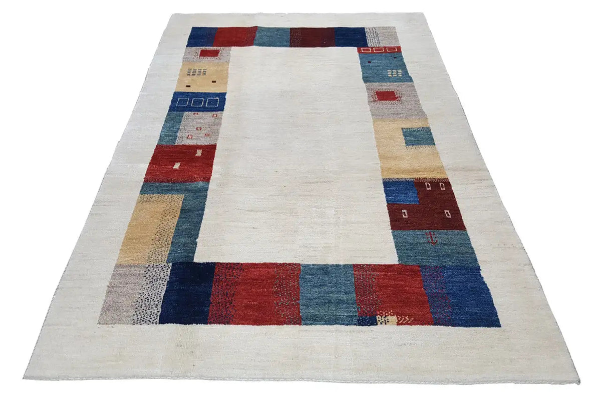 Rectangular Gabbeh rug with a central light-colored area and colored border sections