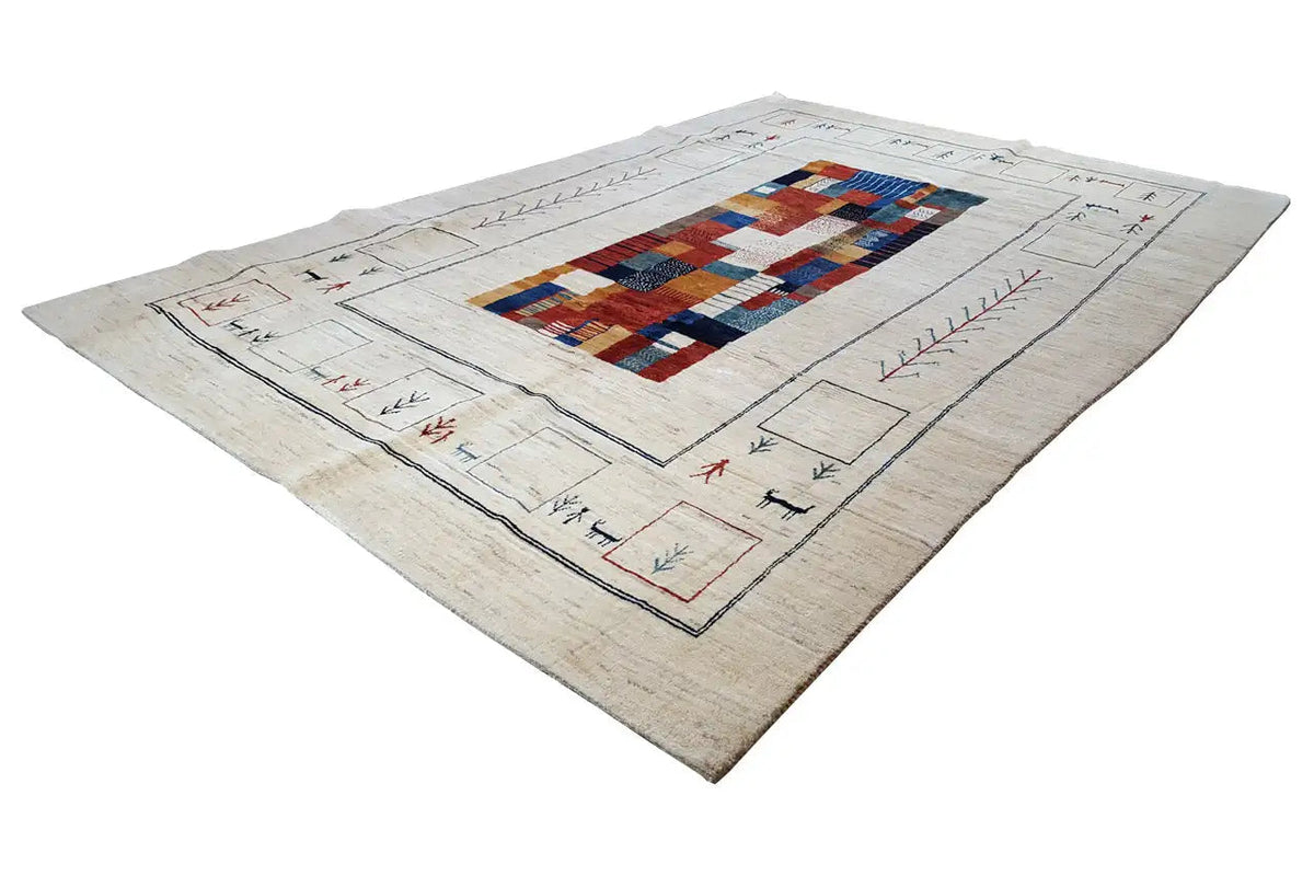 Gabbeh rug, beige base color, diagonal view with a geometric red-blue pattern