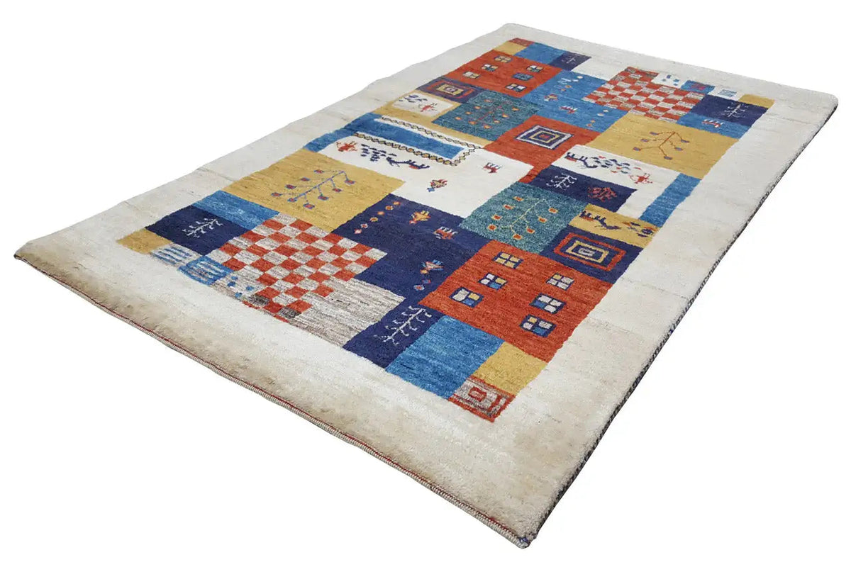 Gabbeh rug with colorful tiles and border, blue-red tones on a light background