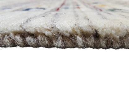 Rug edge with fringes made of virgin wool, beige pile, and fine red stitching