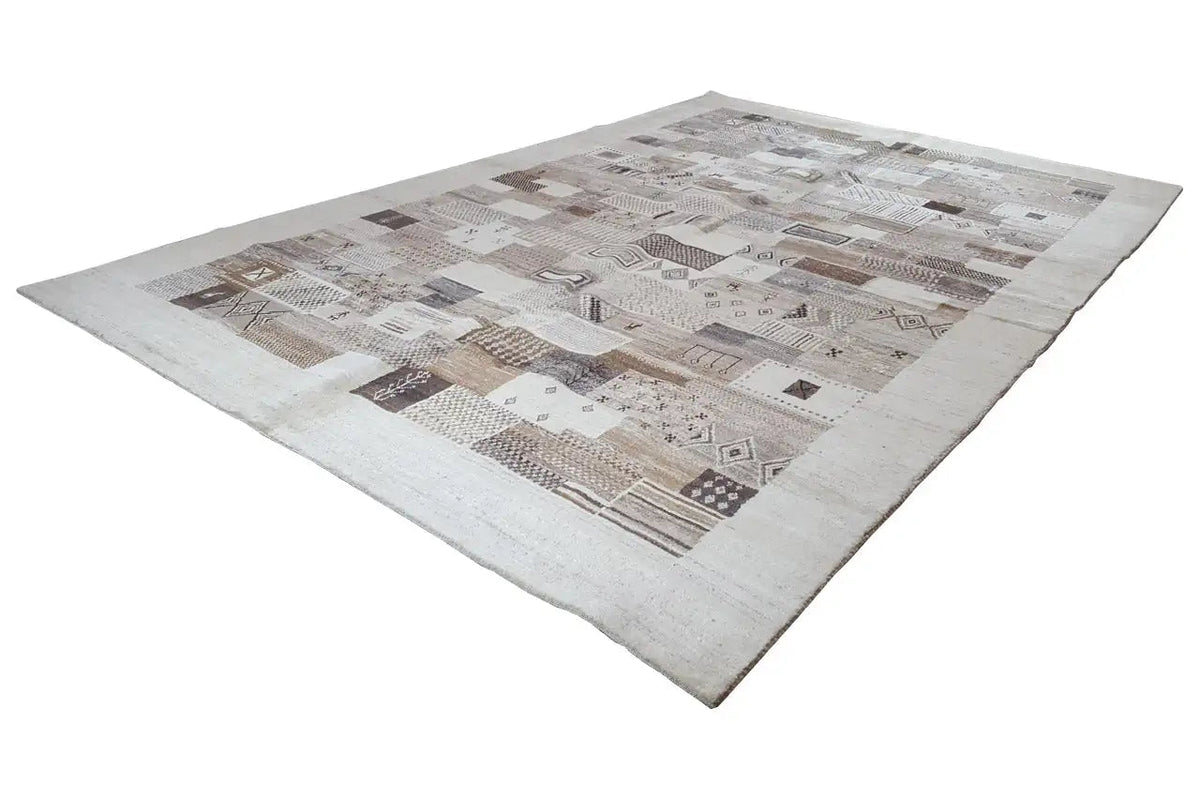Rug with a rectangular patchwork design in beige, gray, and brown