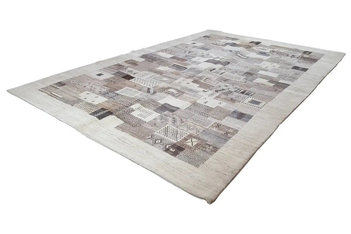 Rectangular Gabbeh rug with beige-gray areas and brown ornamental insets