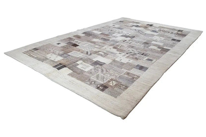 Rectangular Gabbeh rug with beige-gray areas and brown ornamental insets