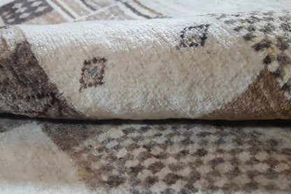 Carpet surface: beige fabric with dark brown-gray patterned squares