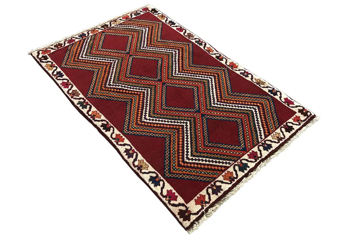 Gabbeh rug in reddish brown, geometric zigzag with diamonds, cream-colored border