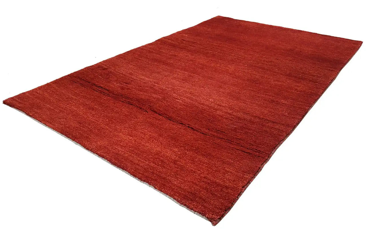 Red carpet, slightly diagonal view, even pile and clean edge