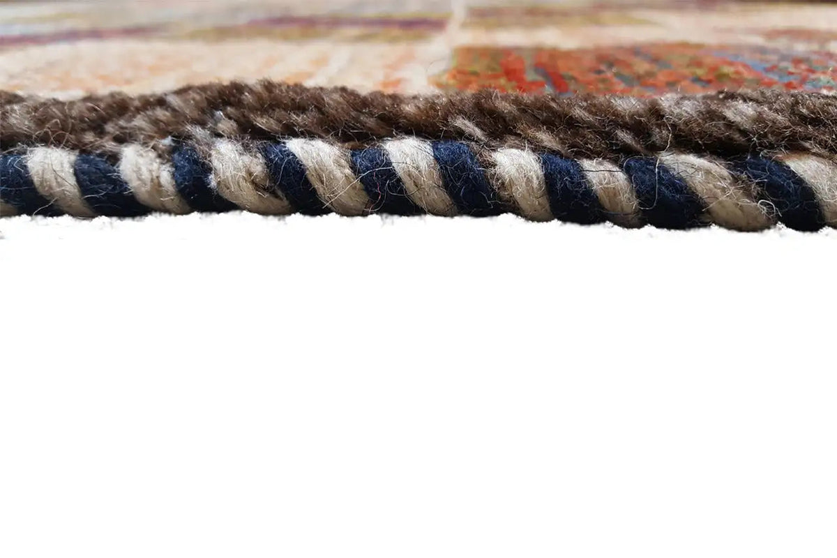Gabbeh rug edge finish with braided fringe trim, multicolored