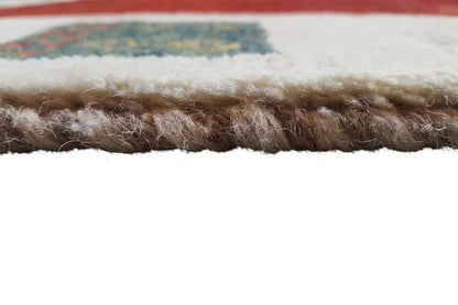 Gabbeh rug: close-up of the rug edge with dense, brownish-red pile.