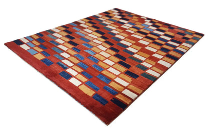 Gabbeh rug with a rectangular geometric pattern in reddish brown, blue, and cream