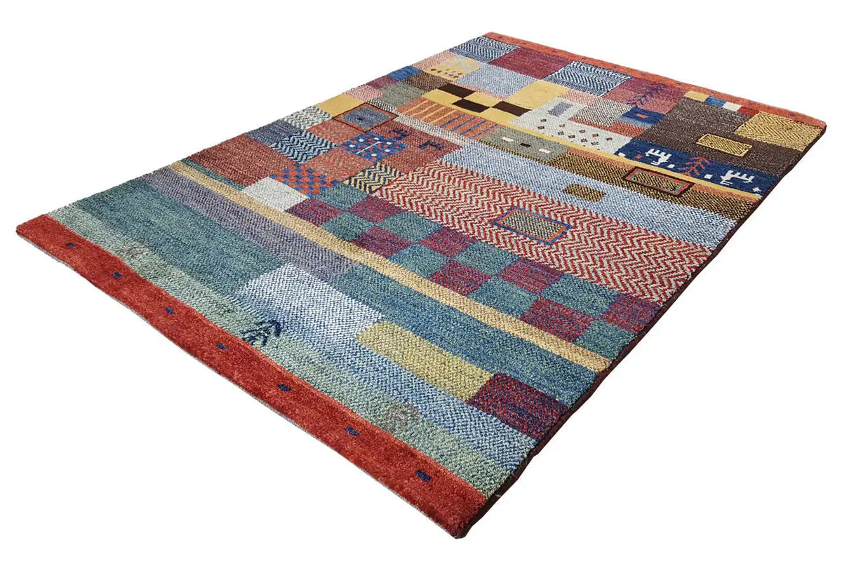 Gabbeh rug with colorful geometric patterns, blue-gray field, red border
