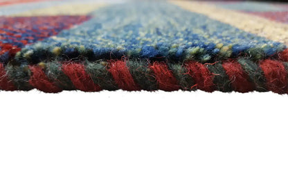 Gabbeh rug edge with short pile and fringes, mixed red and blue