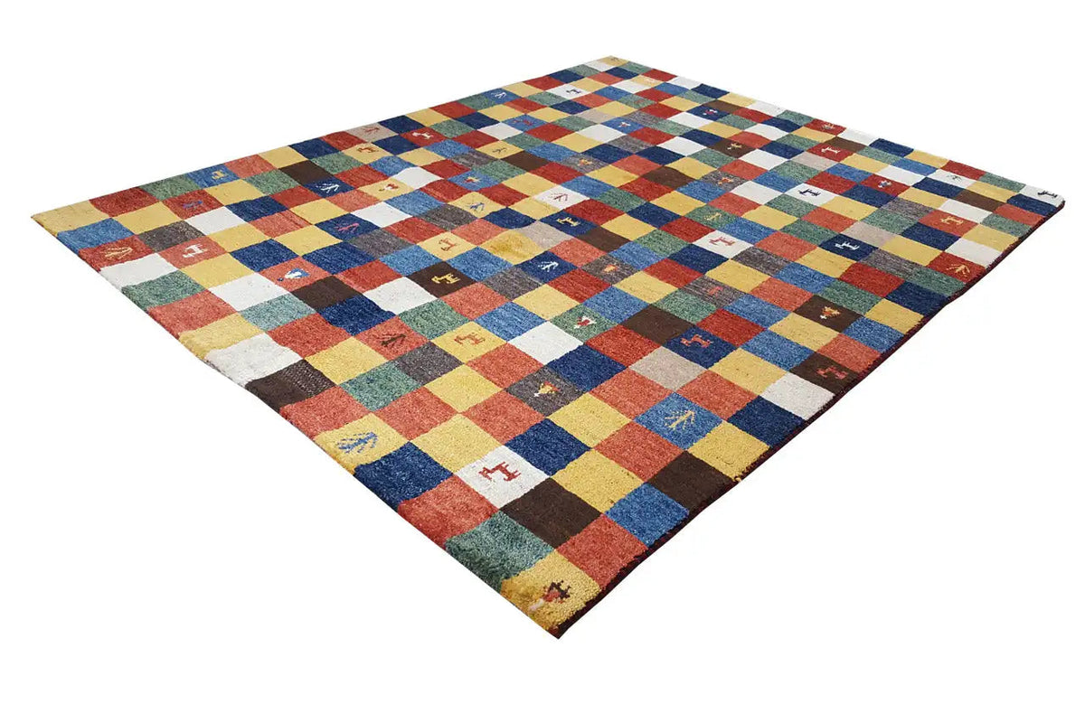 Gabbeh rug spread out, colorful checked patchwork with small figurative motifs