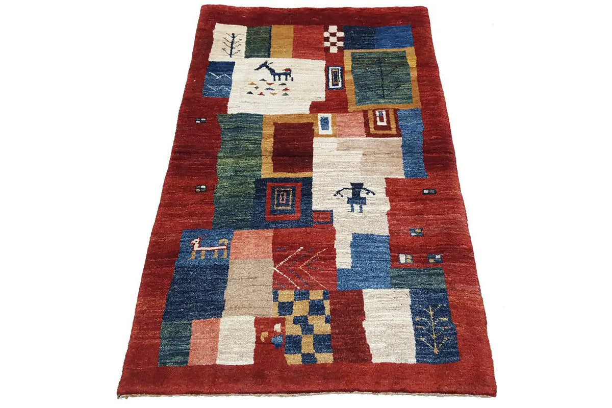 Gabbeh rug 108x62 cm with a red background and geometric patterns in blue and beige