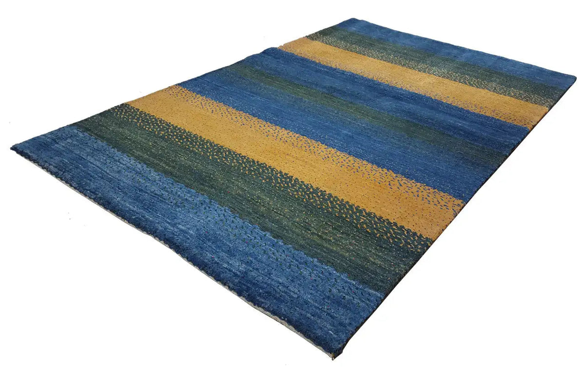 Rug with a visible corner, stripes in blue, green, and ochre