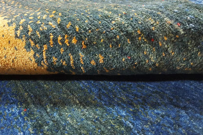 Carpet surface with dense pile, blue, ochre, and green accents