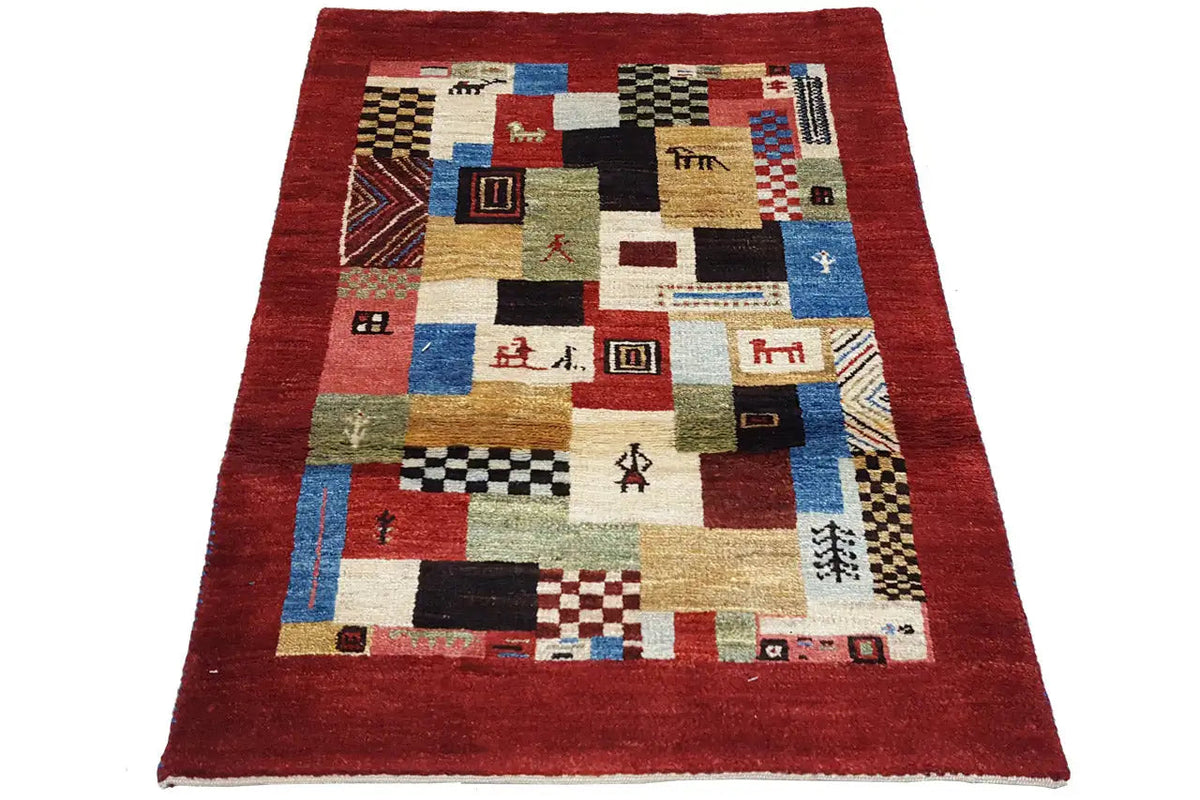 Gabbeh rug, red, flat patchwork with geometric motifs