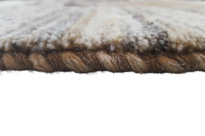 Gabbeh rug with fringed edging: beige pile and brown accents along the edge