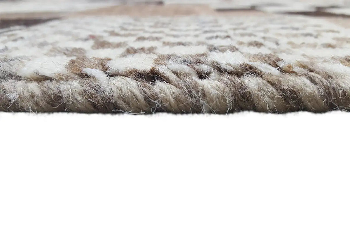 Gabbeh rug with a pile surface and slightly fringed edge, patterned in beige and brown