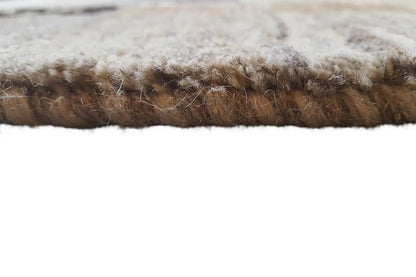 Rug edge with a dense, short pile; multicolored in beige and gray